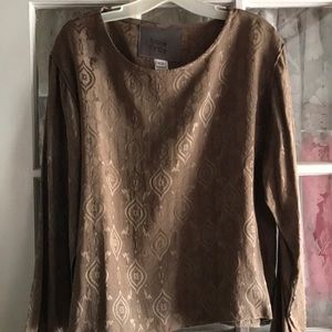 Tan long sleeve pullover Top with side slits at bottom.